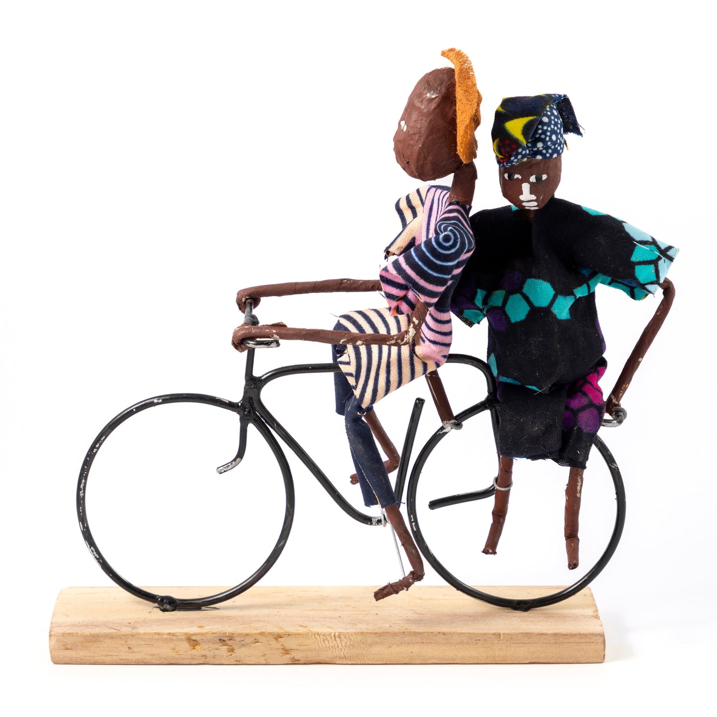 Rustic African Bicycle Rider With Pregnant Passenger