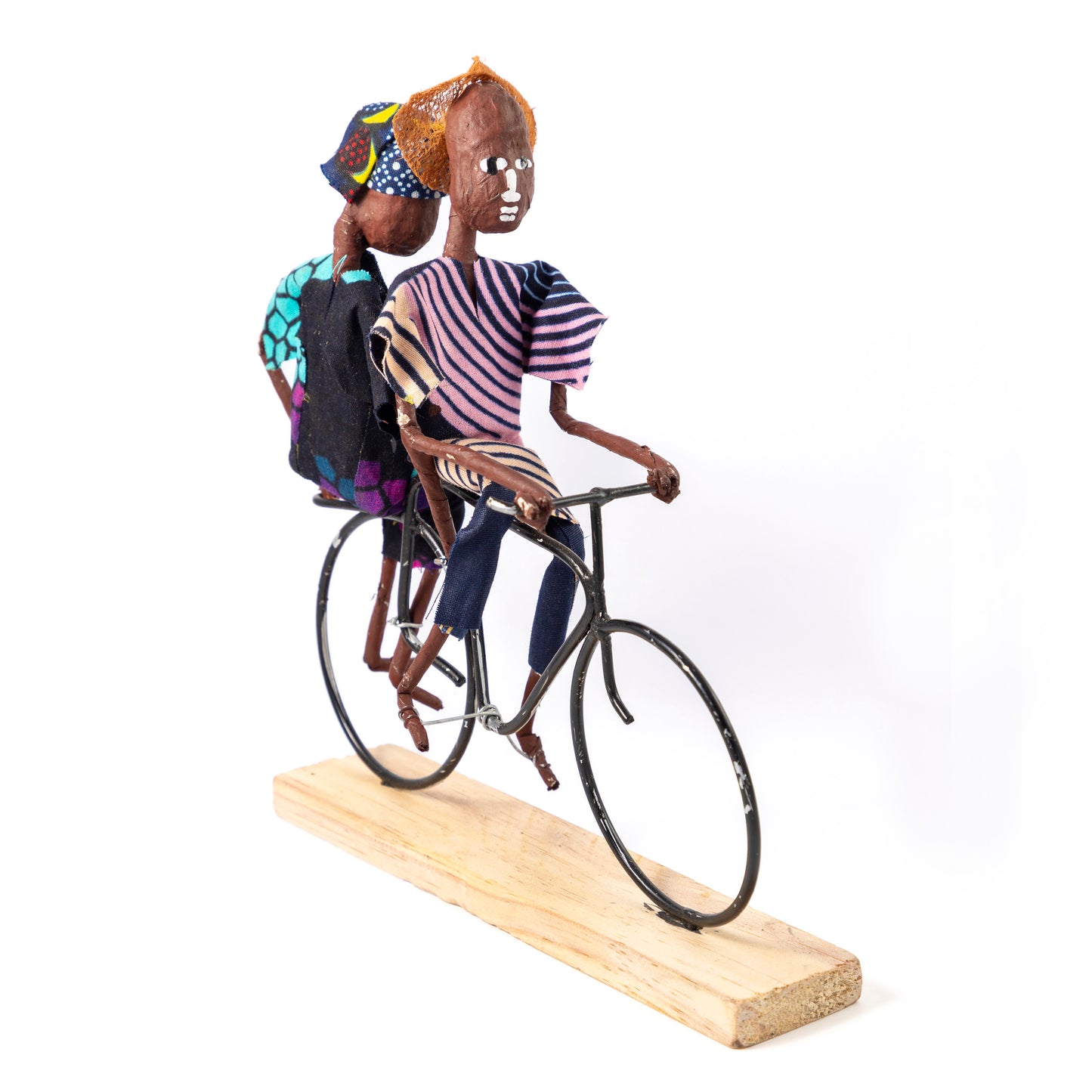 Rustic African Bicycle Rider With Pregnant Passenger