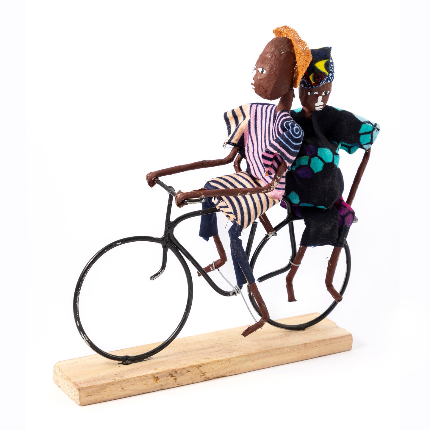 Rustic African Bicycle Rider With Pregnant Passenger