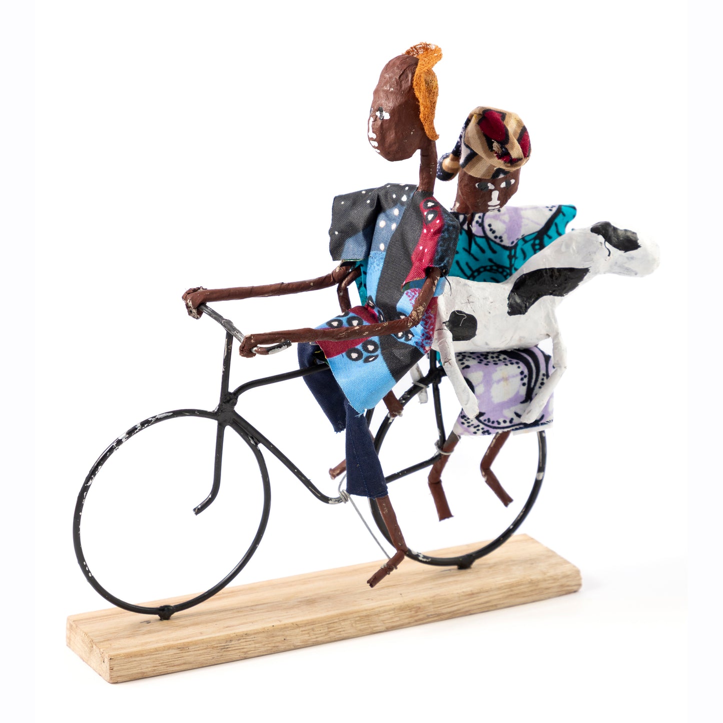 Rustic African Bicycle Riders with Cow