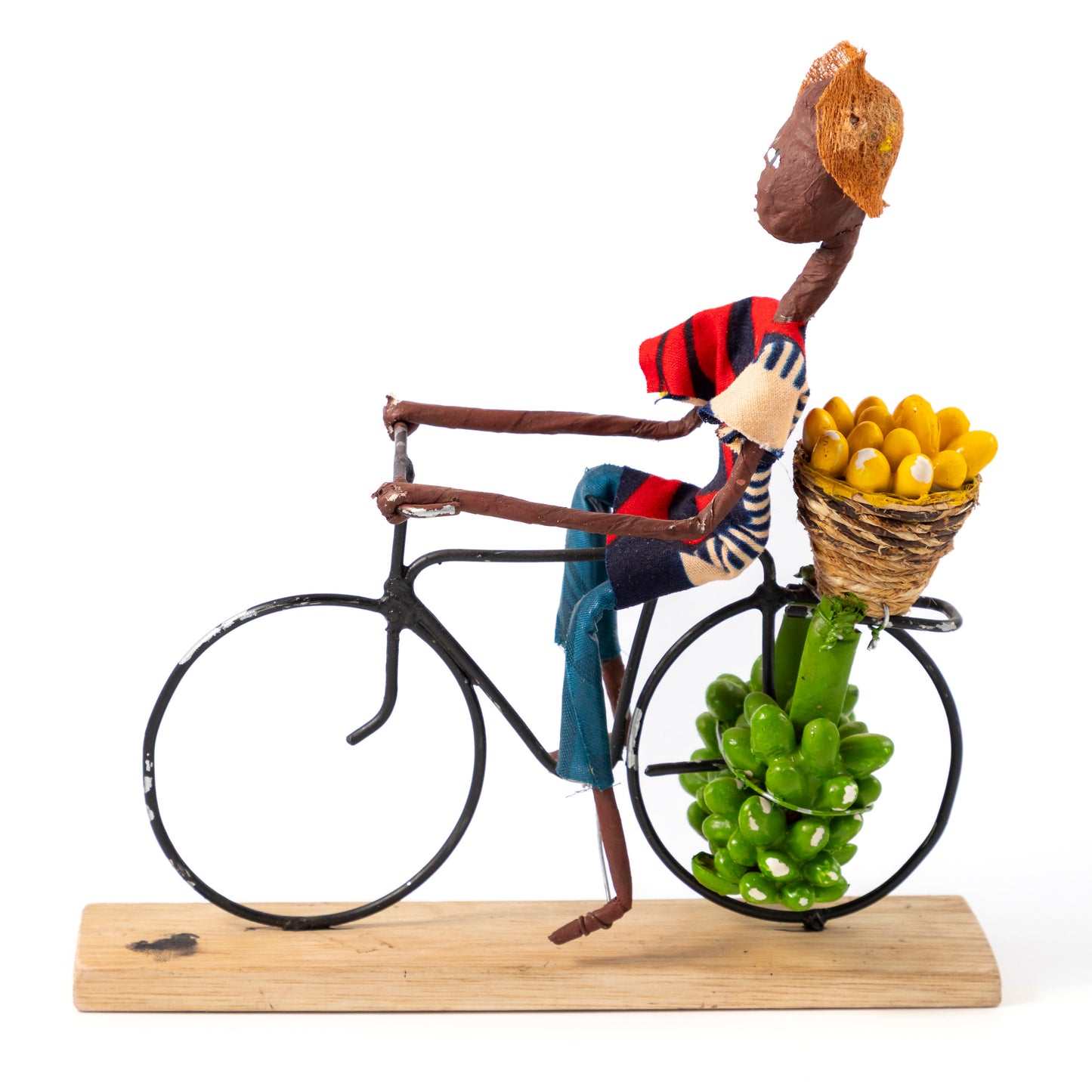Rustic African Bicycle Rider Carrying Vegetables