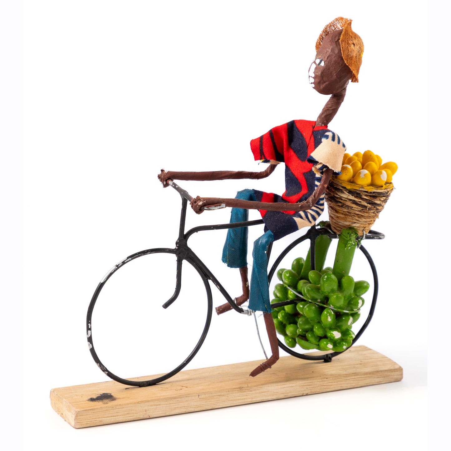 Rustic African Bicycle Rider Carrying Vegetables