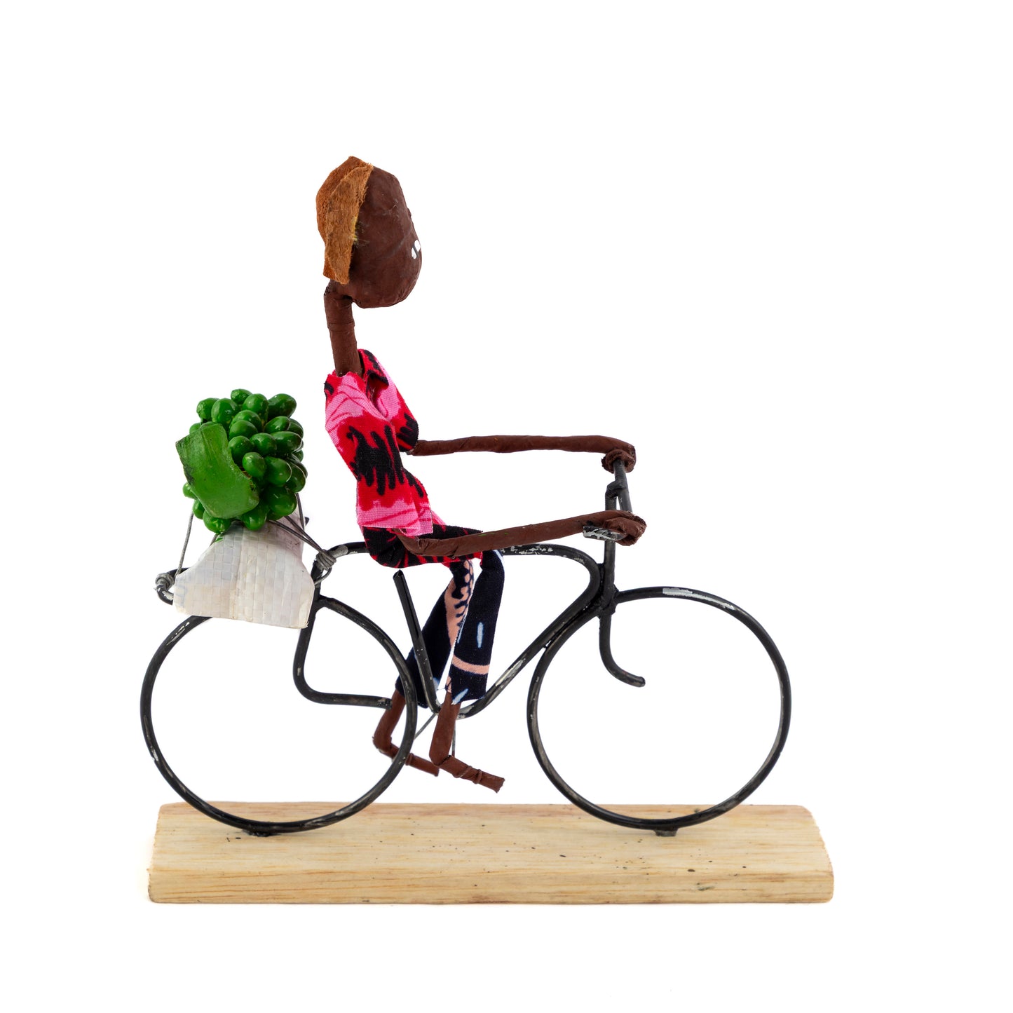 Rustic African Bicycle Rider With Vegetables